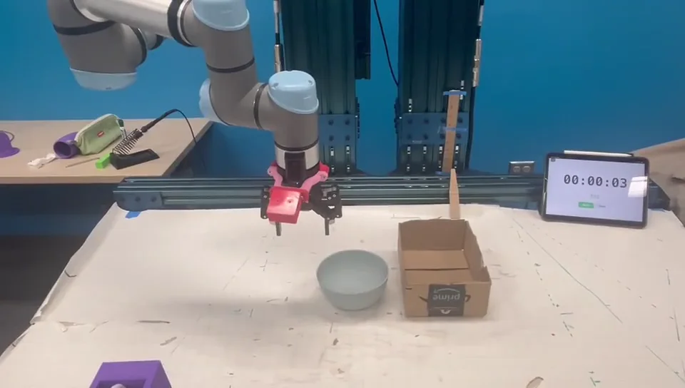 Real robot demonstration of the Bowl-Box tabletop pick-and-place task.