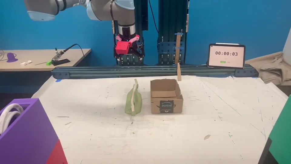 Real robot demonstration of the Pencil Case tabletop pick-and-place task.